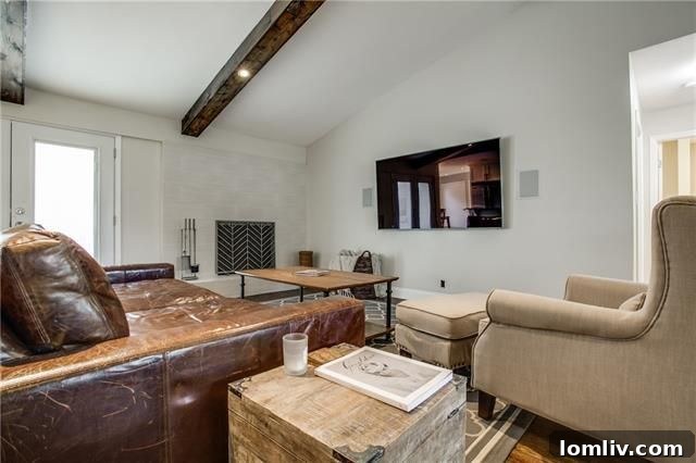 Park Forest Reno: Expansive 2,300+ SqFt with Open-Concept Living and Premium Amenities 8 Detailed shot of the custom painted brick fireplace with elegant metal screen
