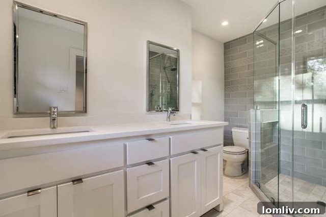 Lochwood's Sweet Escape: A Beautifully Remodeled Ranch 11 Master Bathroom with Modern Fixtures