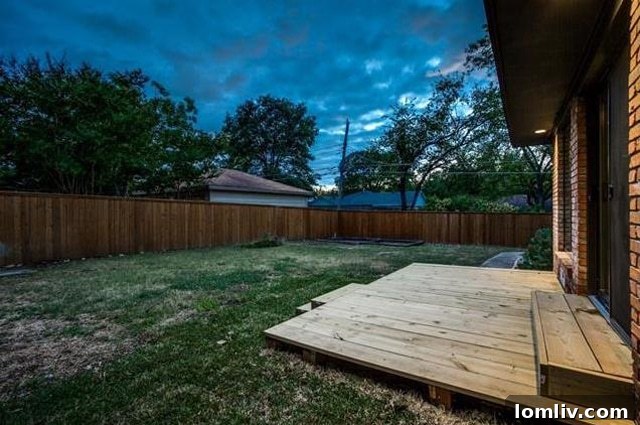 Lochwood's Sweet Escape: A Beautifully Remodeled Ranch 14 Inviting Side Yard with Covered Porch