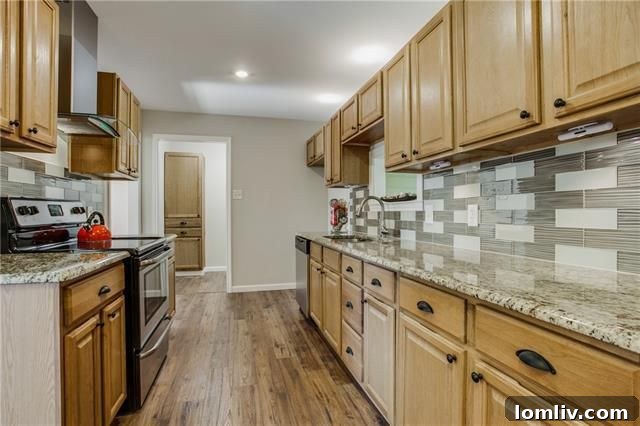 Another view of the elegant dining room, showcasing its connection to the living space for easy entertaining.