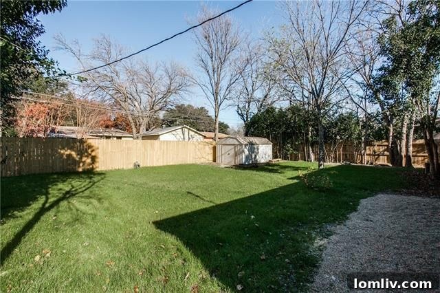 Another view of the modern master bathroom, highlighting the spacious vanity and clean lines.
