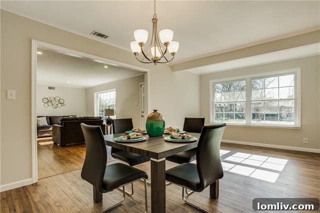 Another angle of the living space, showing the recessed lighting and the seamless transition between rooms.