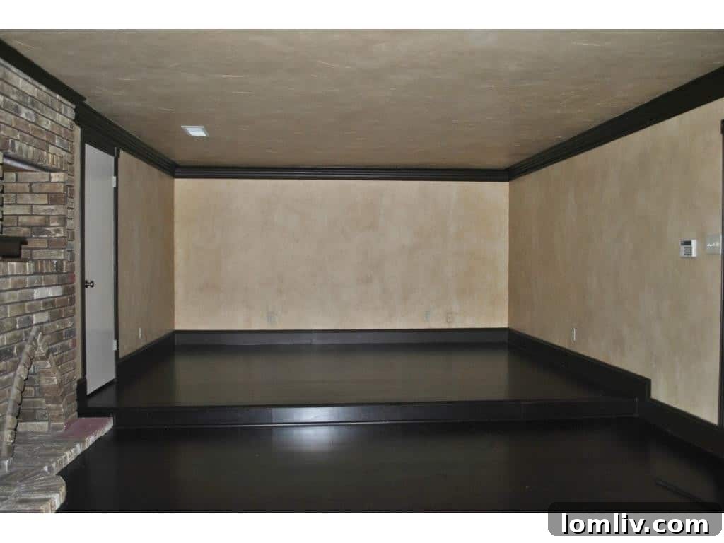 Bright and spacious playroom or entertainment room, designed for leisure activities.