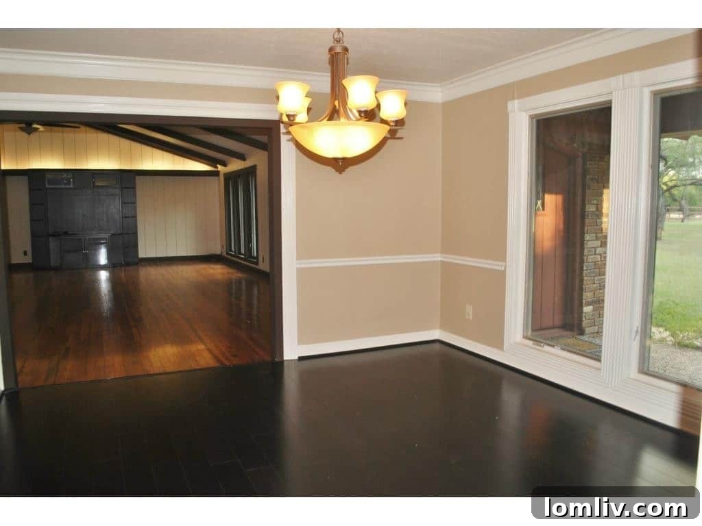 Formal dining area elegantly set for entertaining, reflecting the home's capacity for hosting.