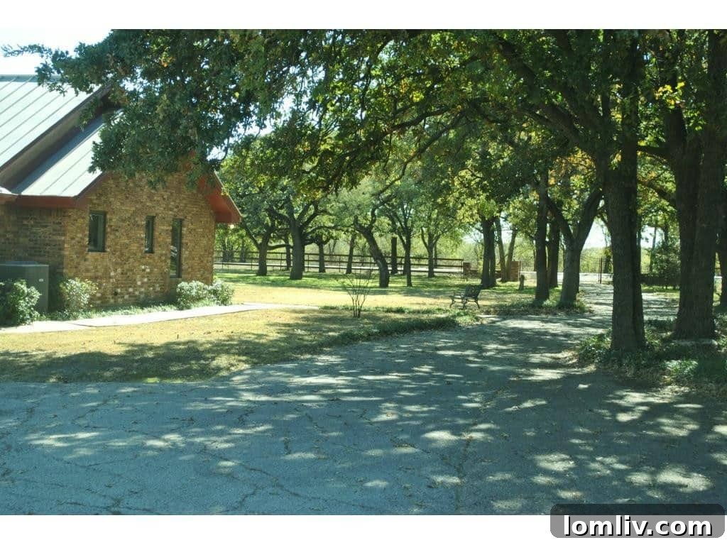 Spacious grounds and meticulously maintained landscaping of the Burleson estate.
