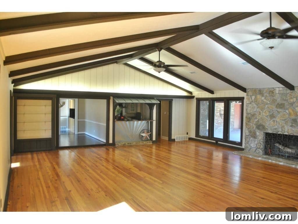 Living area with comfortable seating and inviting family decor, hinting at a relaxed luxury.