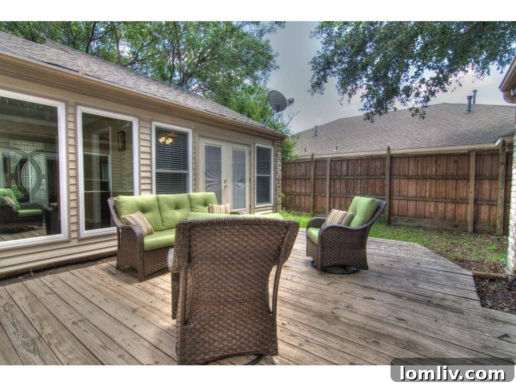 Expansive outdoor deck at 18605 Crownover Court, ideal for entertaining and relaxation.