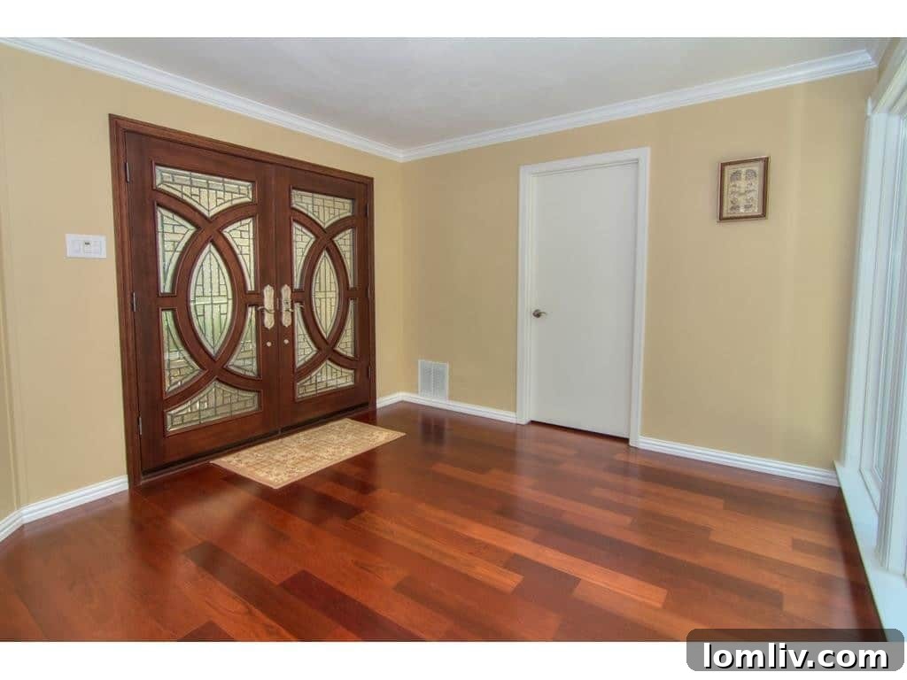 Inviting foyer of 18605 Crownover Court, showcasing the spacious entry with natural light.