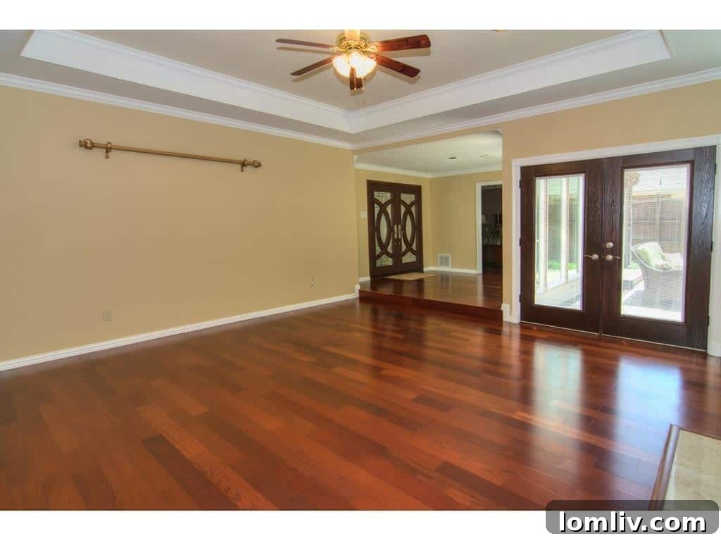 Elegant entry hall with architectural details at 18605 Crownover Court, Dallas.