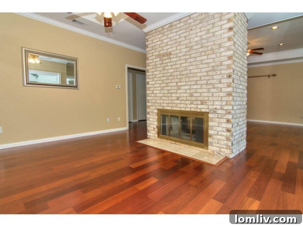 Detail shot of the modern fireplace and hearth in the living room of 18605 Crownover Court.