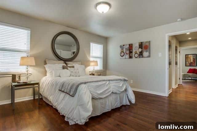 Newly renovated kitchen with lighted glass cabinets, granite counters, and stainless steel appliances