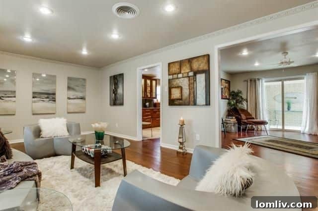 Another perspective of the bright and open family room with access to the backyard