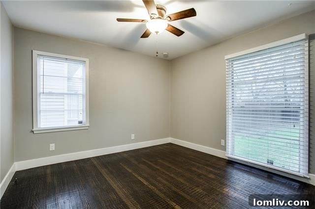 3930 Beechwood Lane - Lush green lawn and mature trees in the backyard