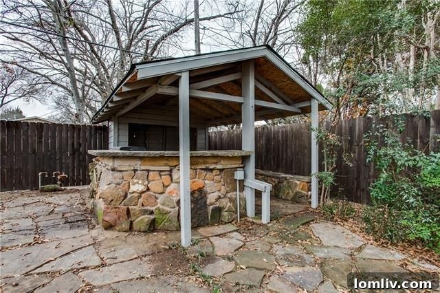 3930 Beechwood Lane - Side view of the renovated cottage, showing architectural details