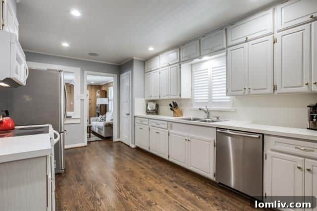 Renovated Kitchen with White Cabinets, 1407 Eastus Drive