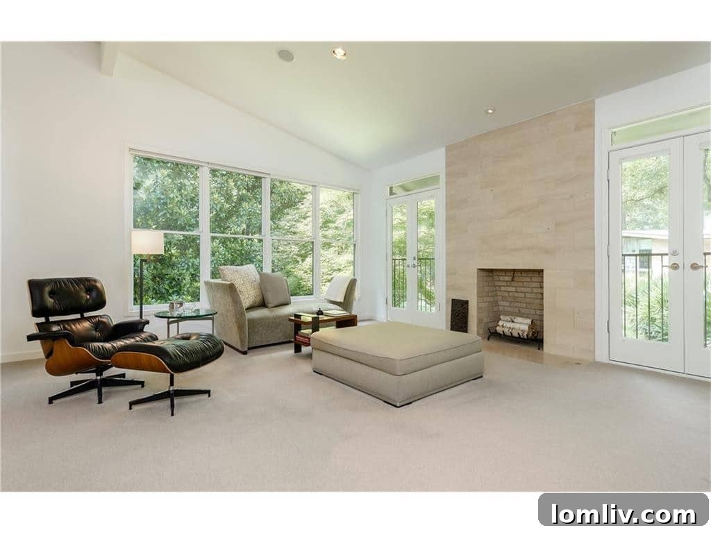 Cozy Master Bedroom Sitting Area with Natural Light in Luxury Dallas Real Estate
