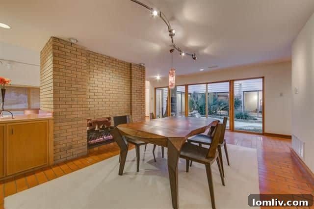 Indoor-outdoor living connection to the private courtyard pool
