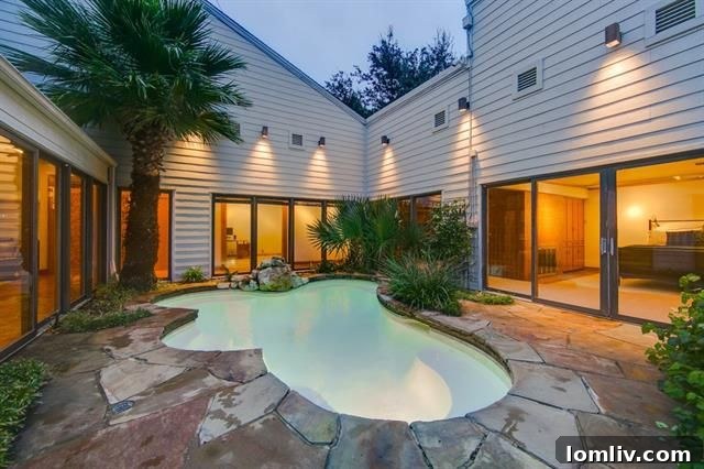 Serene backyard with mature landscaping and ample seating area