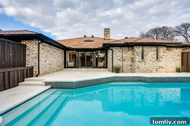 Spacious backyard with a pristine swimming pool