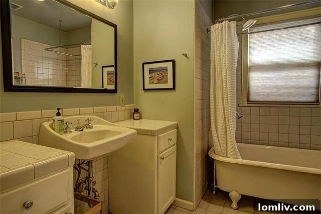 Bathroom featuring a classic clawfoot bathtub