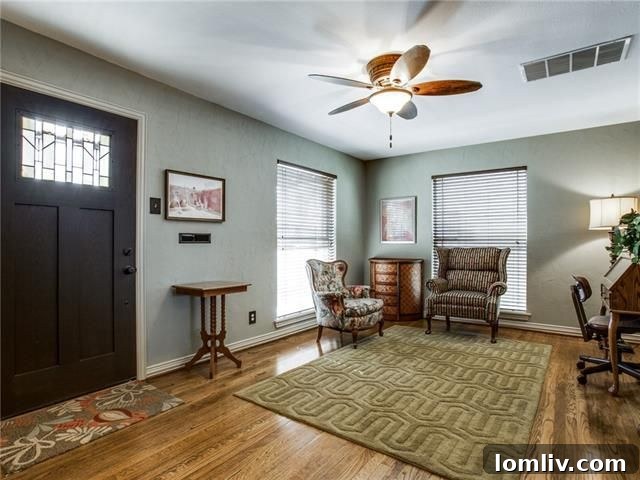 Inviting living room with hardwood floors in the Terry Heights cottage