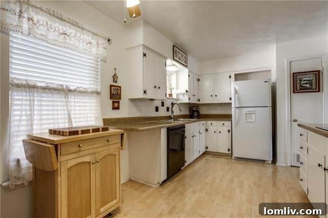 Well-preserved mint green tiled bathroom at 10655 Longmeadow Dr