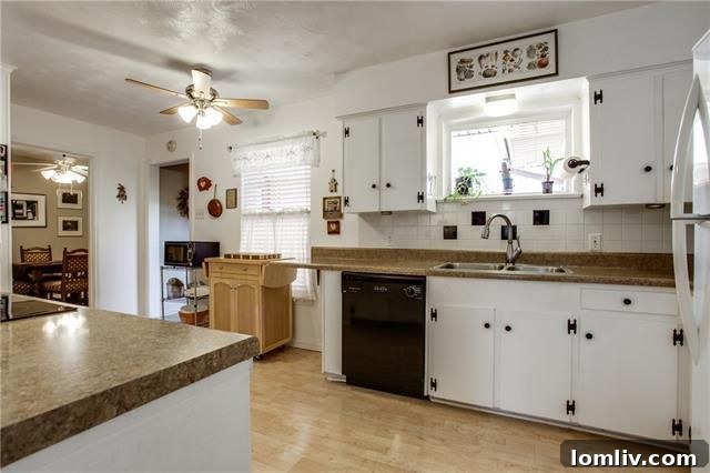 Spacious kitchen with updated features at 10655 Longmeadow Dr