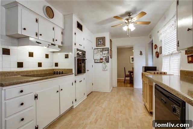 Overview of the living area showing hardwood floors at 10655 Longmeadow Dr