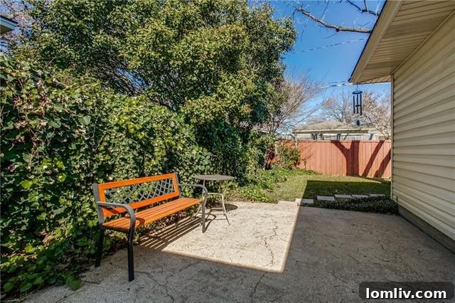 Patio area perfect for outdoor dining at 10655 Longmeadow Dr