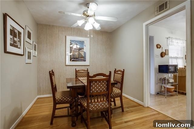 Cozy bedroom featuring ample light at 10655 Longmeadow Dr