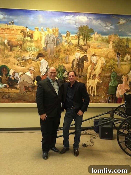Robbie Briggs and Bernie Uechtritz before the Adria Martinez painting