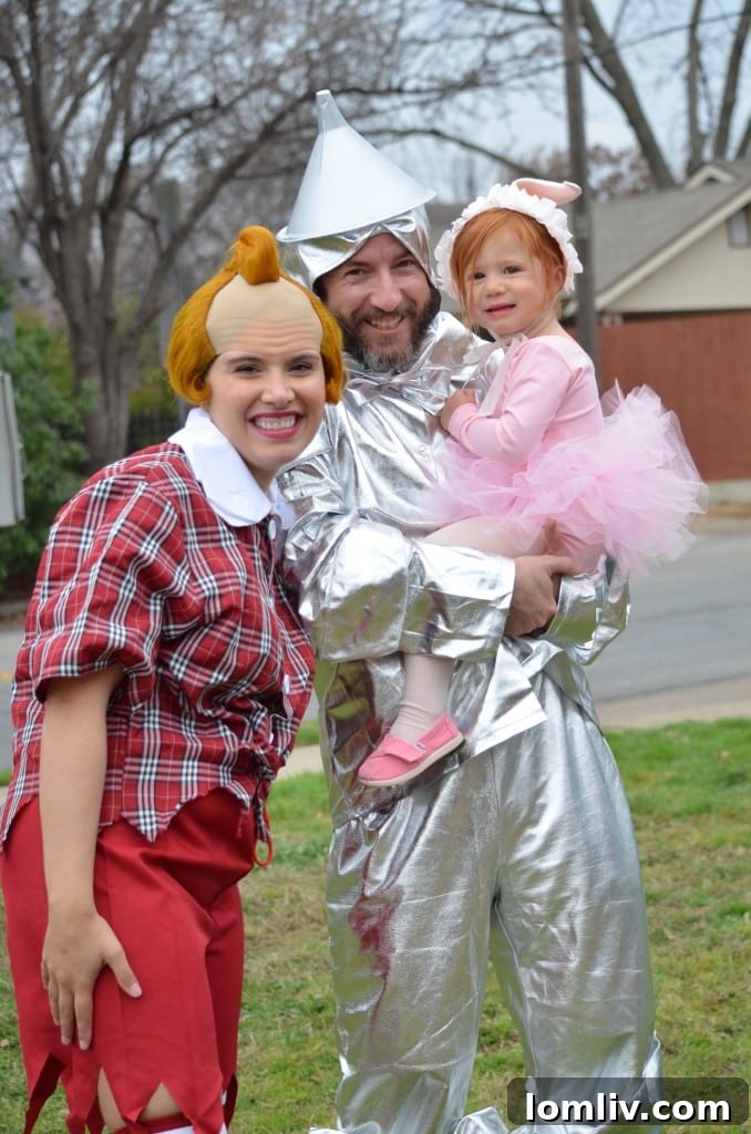 Family enjoying the Winnetka Heights Wizard of Oz float, dressed in festive costumes during the Mardi Gras parade.