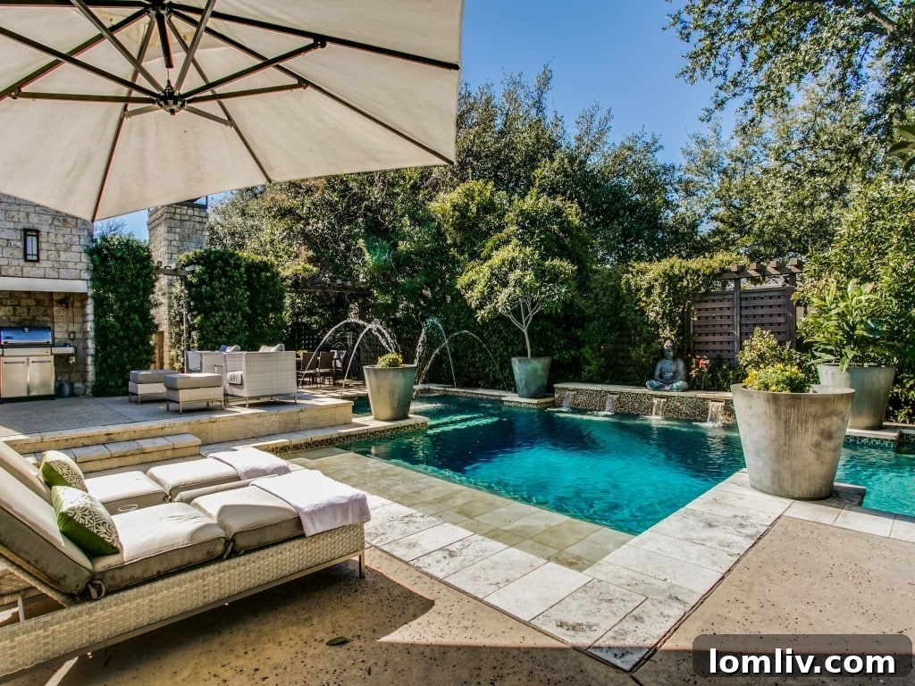 Spacious patio with an outdoor fireplace, creating an inviting ambiance.