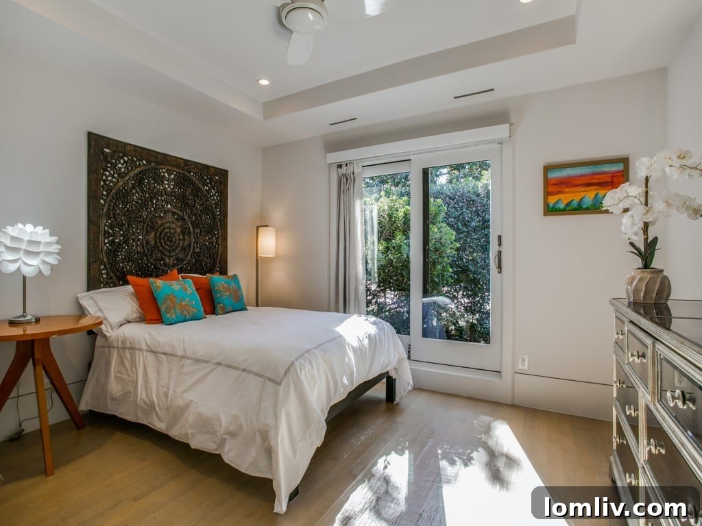 Spacious master bath with elegant fixtures and ample natural light.