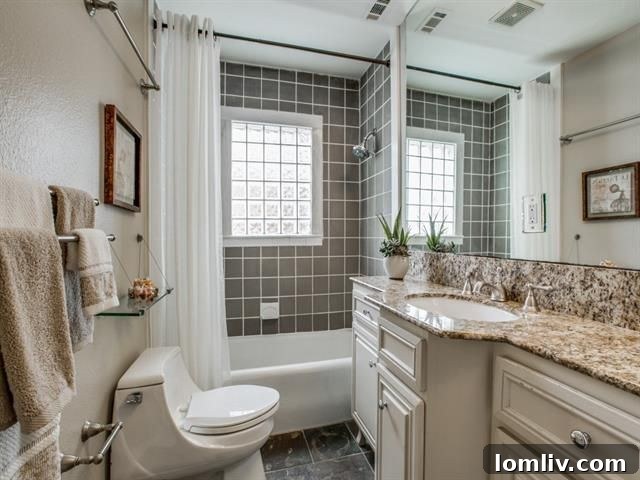 Well-maintained backyard offering potential for expansion in a charming East Dallas Tudor