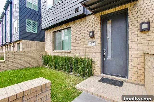 Sleek modern townhome exterior with clean lines in downtown Dallas