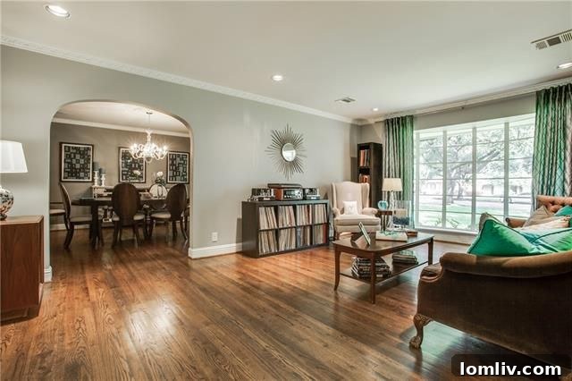 Spacious living room with an open kitchen design, perfect for entertaining
