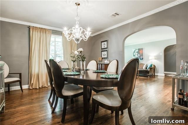 Gourmet kitchen featuring marble and quartz countertops, white farm sink, and stainless steel appliances
