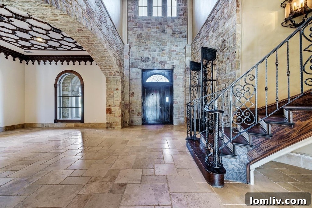 Luxurious Foyer with Stained Glass Canopy and Travertine Floors
