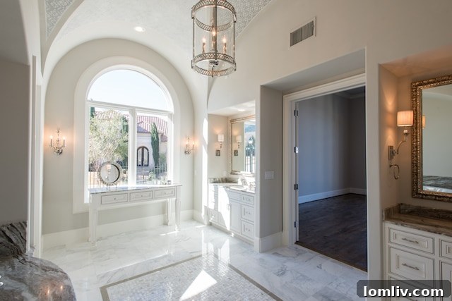 A tastefully designed cozy seating area featuring stylish furniture, bespoke built-ins, and a warm ambiance perfect for relaxation at 6923 Ranier