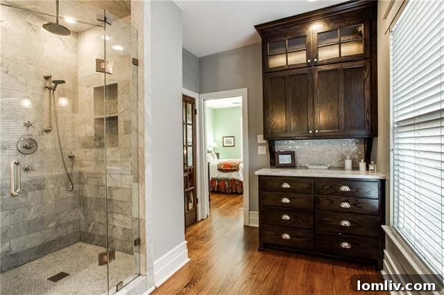 Master bedroom with Rookwood fireplace in historic home