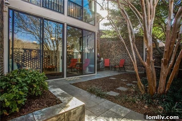 Sleek modern exterior of Preston Square Townhome