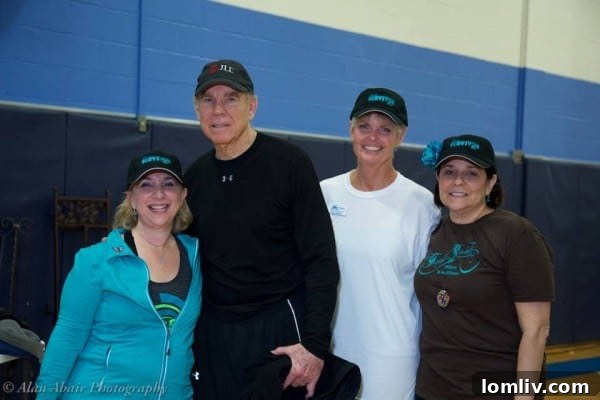 Roger Staubach and Julie Shrell at a Be The Difference Foundation event, likely Wheel to Survive.