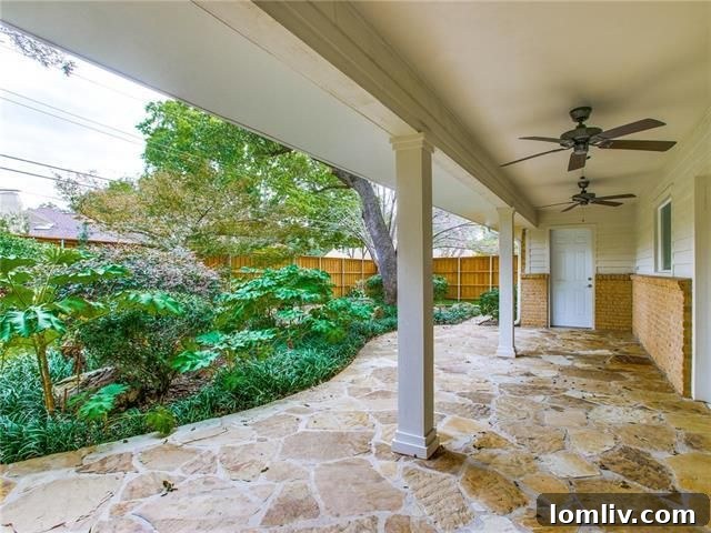 Landscaped Backyard with Covered Patio at Les Jardins Home