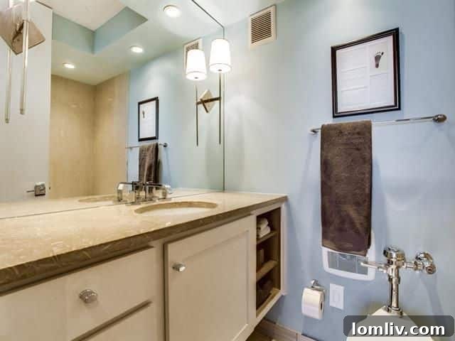 Bright Bedroom with Built-in Desk in Dallas Condo