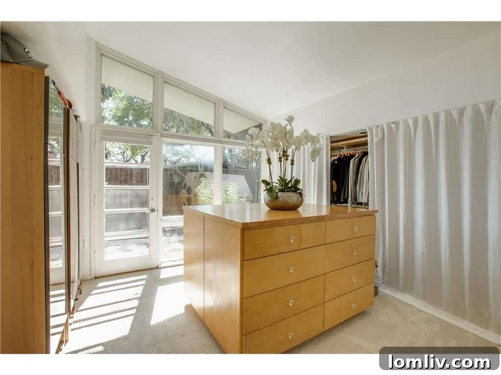 Expansive Walk-in Closet with Natural Light in Master Suite