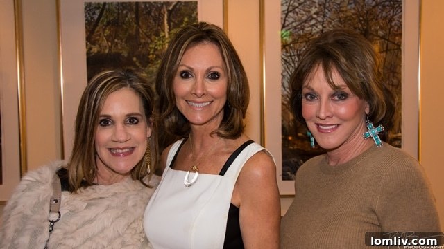 Smiling faces at the Capital Title Cupids & Cocktails party