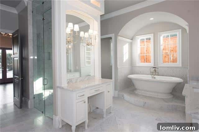 Opulent Master Bathroom with Marble Finishes