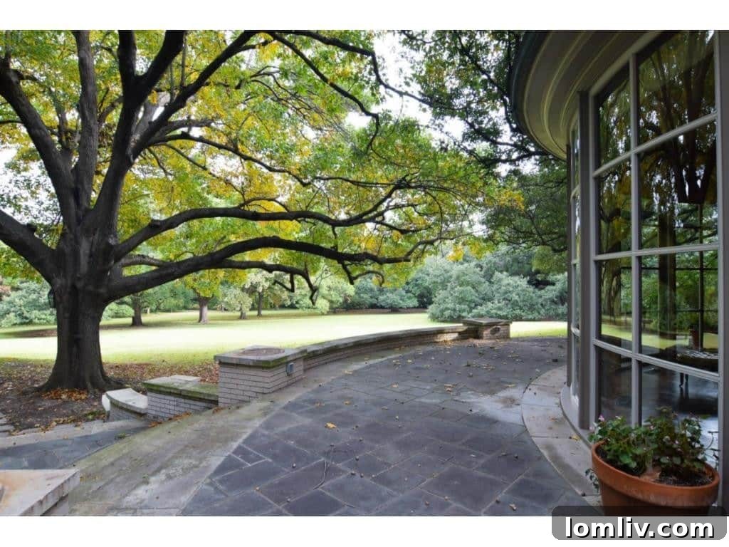 Dallas's Richest Real Estate: Did Andy Beal Acquire the Two Most Expensive Mansions? 10 Expansive grounds of the Margaret Crow Estate, showcasing meticulous landscaping at 4500 Preston Road.