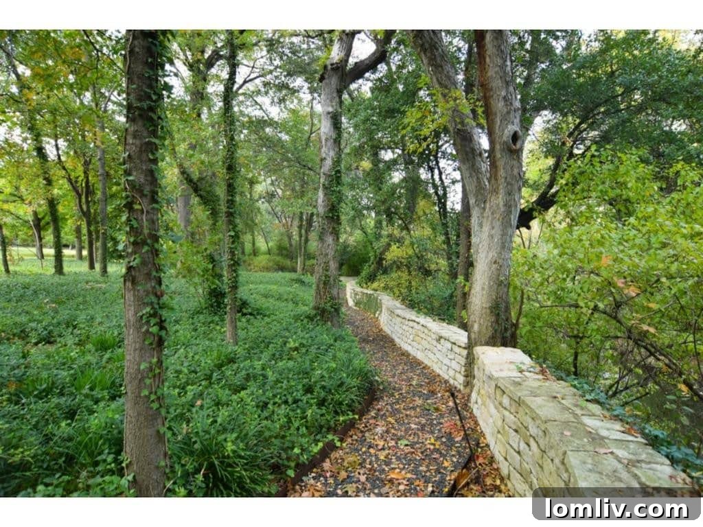 Dallas's Richest Real Estate: Did Andy Beal Acquire the Two Most Expensive Mansions? 19 A charming walkway meandering through the lush gardens of the Margaret Crow Estate, 4500 Preston Road.